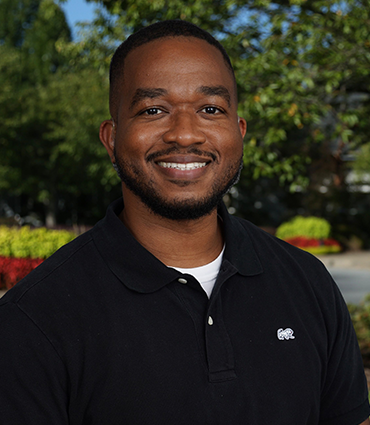 Headshot of Vyron Kinson.