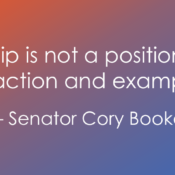 An image featuring a white text quote on a horizontal gradient background that transitions from orange on the left to purple and blue on the right. The text reads: “Leadership is not a position or a title, it is action and example.” — Senator Cory Booker